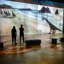 Poster image for the exhibition titled Prehistoric Planet: Discovering Dinosaurs